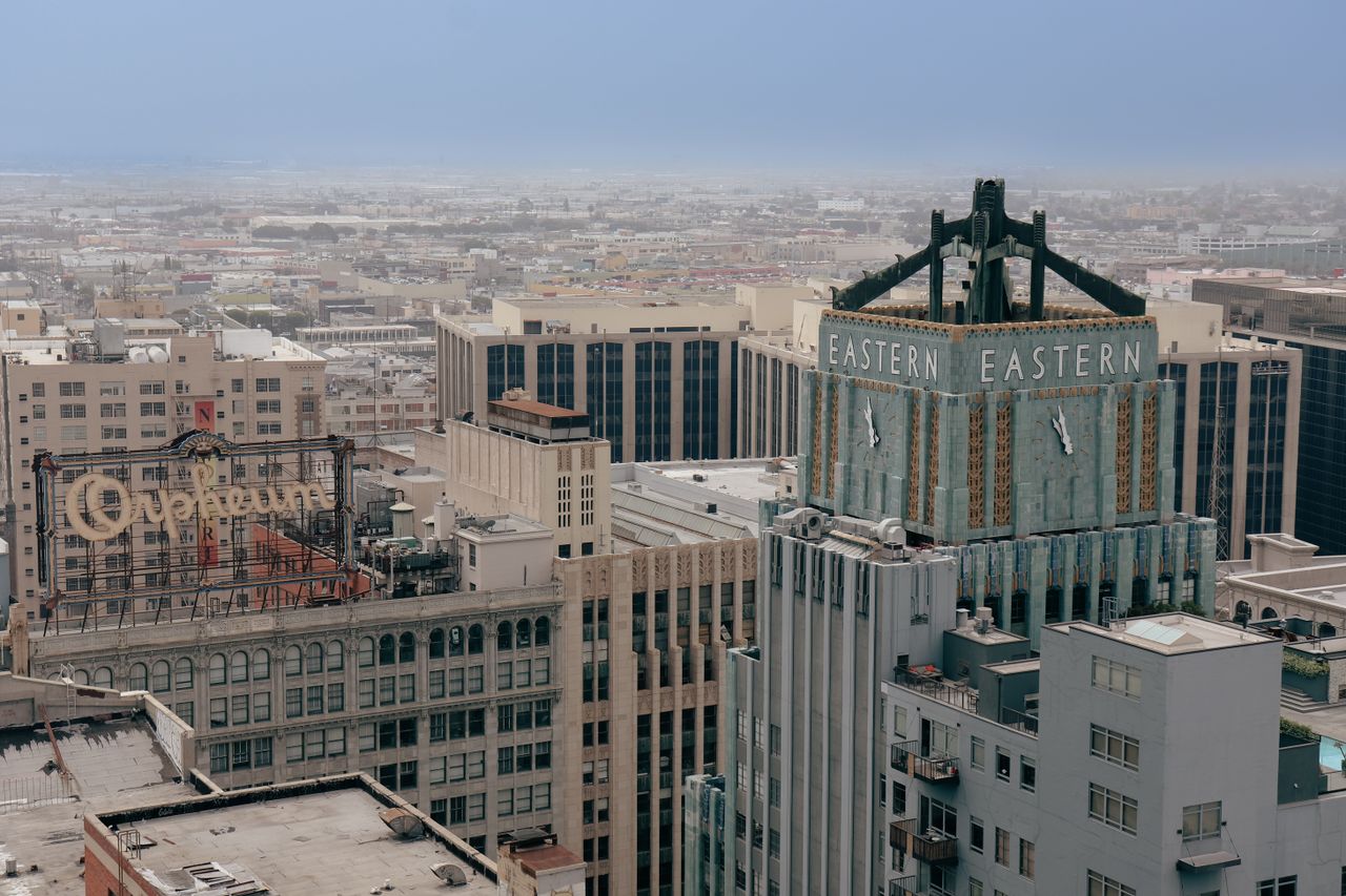 Home Aerial view of the iconic Eastern Columbia Building and surrounding cityscape in downtown Los Angeles.